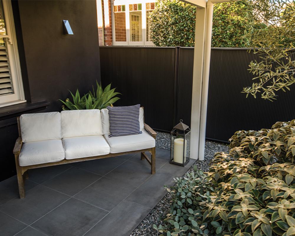 Modern patio with fence screening using
