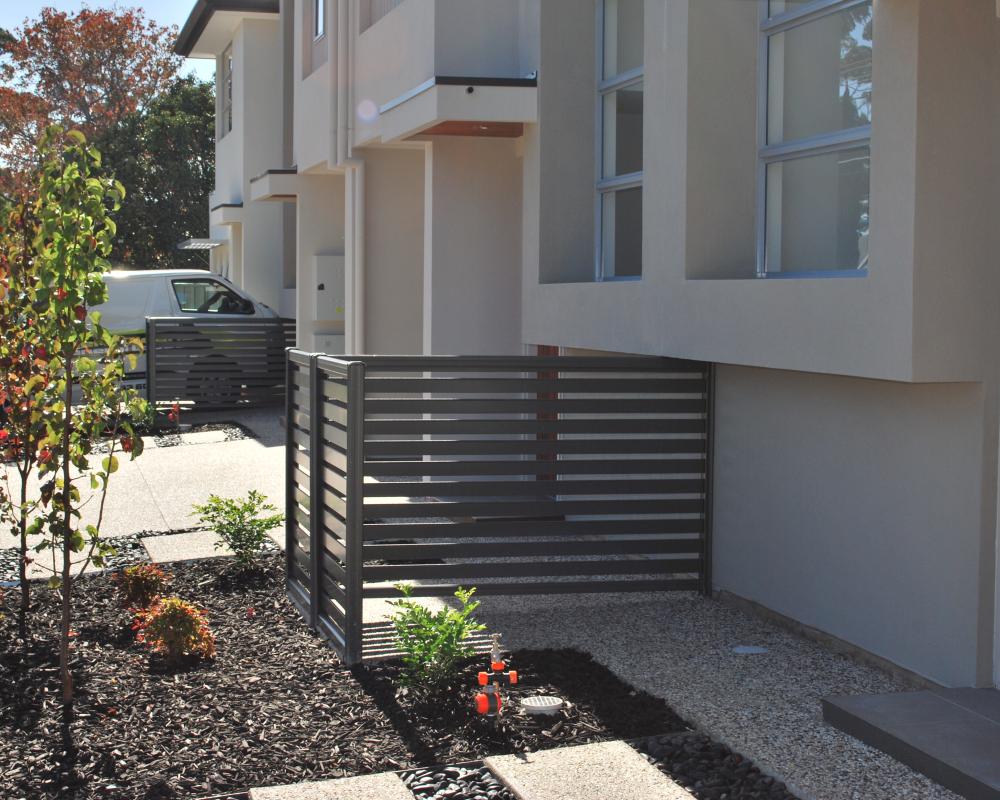 Fielders Slat Screening used for fencing in Australian homes, in Colorbond colour Monument 