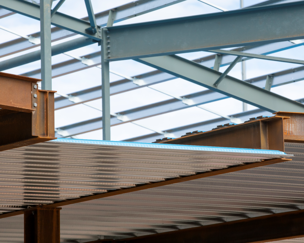 Close-up of composite steel formwork metal decking spanning beams for formwork and framing