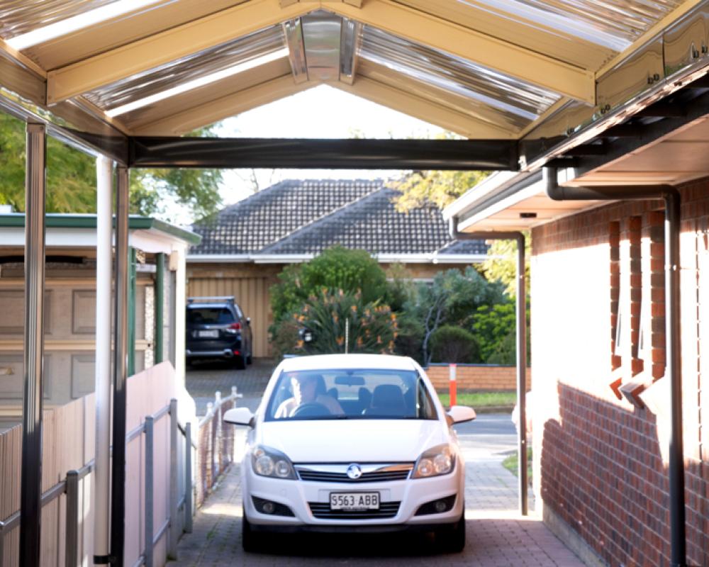 Gable roof carport attached to a brick home, a style that sits among the most popular carport designs in Australia