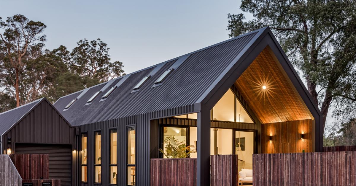 Modern home with dark COLORBOND® steel roofing and wall cladding, showing how roofing colour defines contemporary design