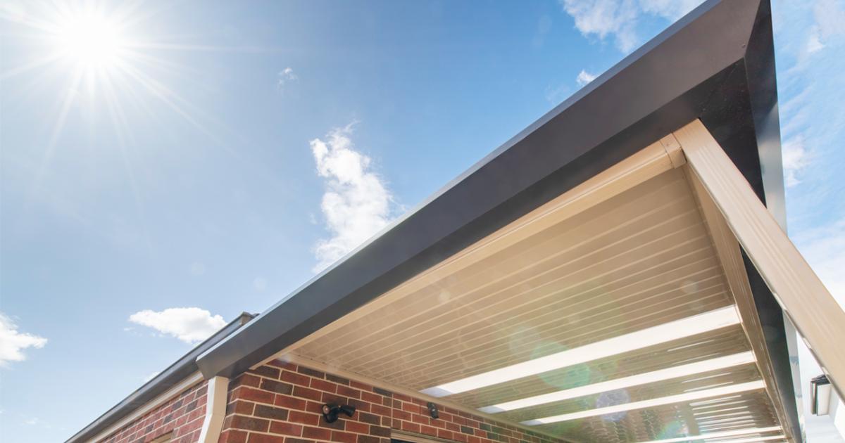 Underside of a steel awning against blue sky, illustrating how COLORBOND colours read differently in full Australian sunlight