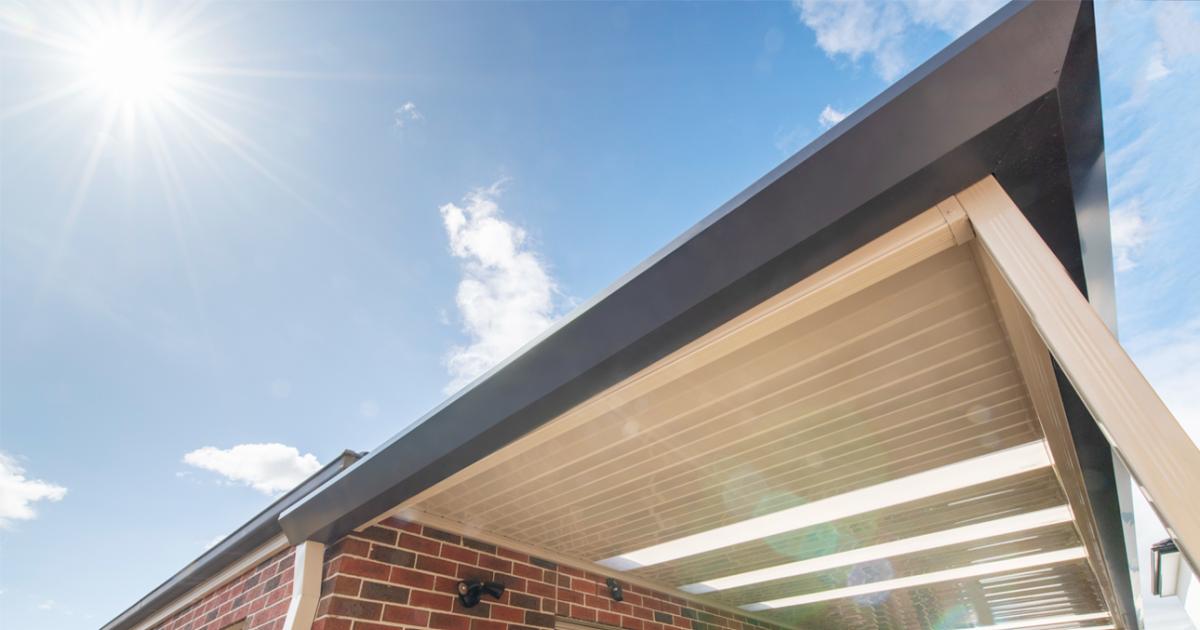 Underside of a steel awning against blue sky, illustrating how COLORBOND colours read differently in full Australian sunlight